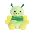 A green and yellow stuffed animal adorned with a pink bow, showcasing a playful and cheerful design.
