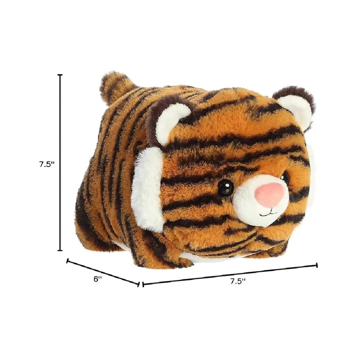A cute stuffed tiger sitting on a bright white background.
