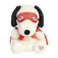 Stuffed dog wearing a red mask and holding a red heart, showcasing a playful and affectionate design.