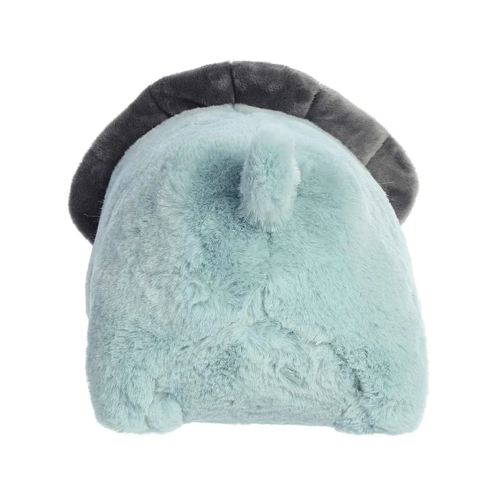 A soft blue stuffed animal adorned with horns, offering a whimsical touch to children's toys.
