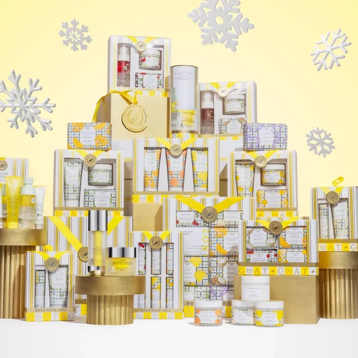An assortment of body care products: body scrub, body lotion, and body wash, presented attractively.