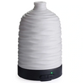 This Candle Warmers Airome Harmony Medium ultrasonic Essential Oil Diffuser releases a fine, cool mist that carries your favorite essential oils throughout your space.