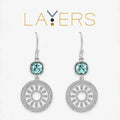 Stylish silver huggie earrings featuring delicate quatrafoil detailing for women