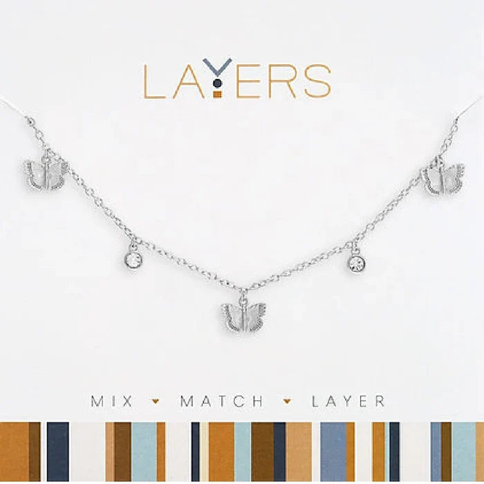 Silver multi petite butterfly layered necklace with delicate feminine design