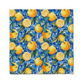A blue and yellow patterned towel featuring vibrant oranges scattered across its surface.
