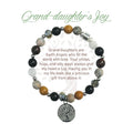A close-up of a giant joy bracelet designed for daughters, showcasing colorful beads and a cheerful charm.