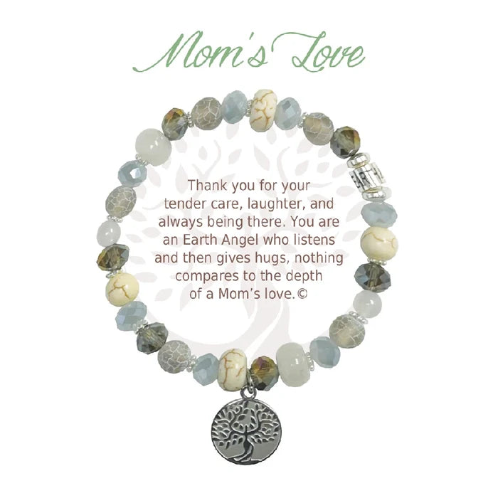 A close-up of a mom's love bracelet featuring a delicate heart charm, symbolizing affection and connection.