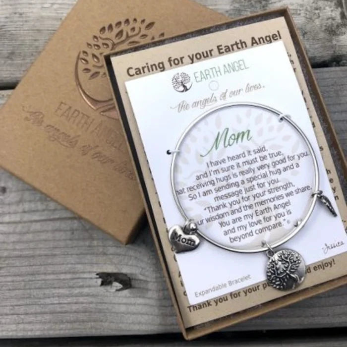 Delicate earth angel bracelet adorned with gemstones and angel motifs, representing guidance and spiritual connection.