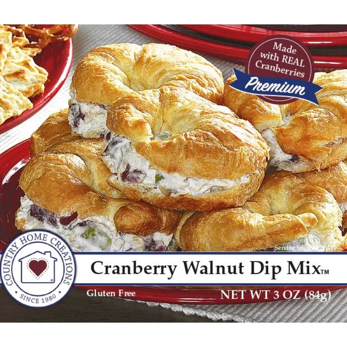 A plate of food served on a red and white patterned plate, showcasing a colorful and appetizing meal.