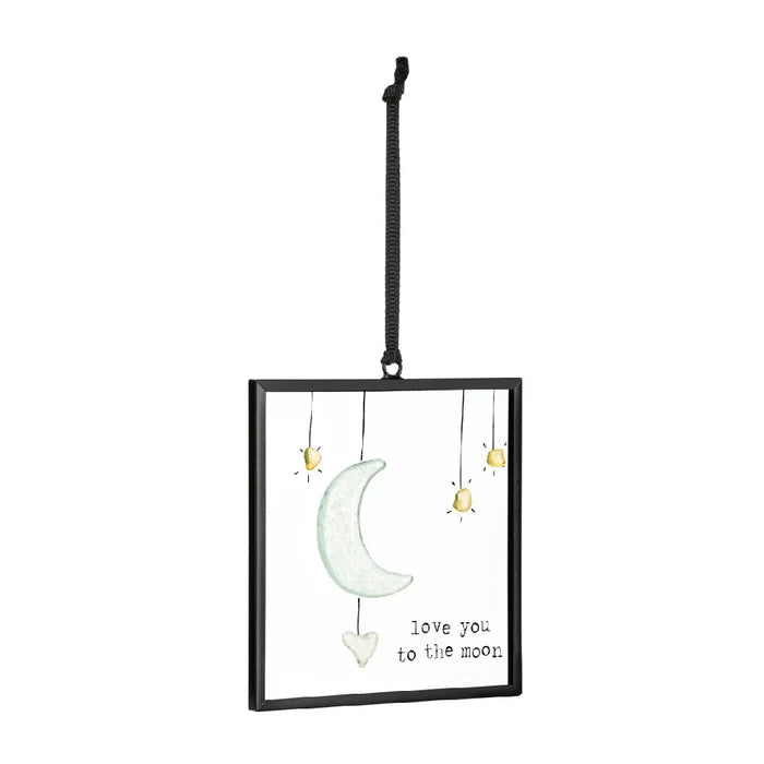 A charming ornament displaying the words "I love you to the moon and back," perfect for expressing affection.