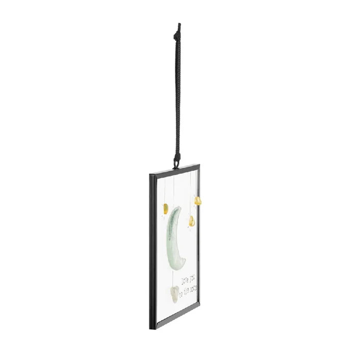 A heartfelt hanging ornament featuring the phrase "I love you to the moon and back," symbolizing deep love.