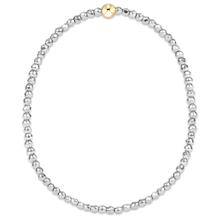 enewton design bright silver faceted hematite beaded bracelet with single gold accent bead.