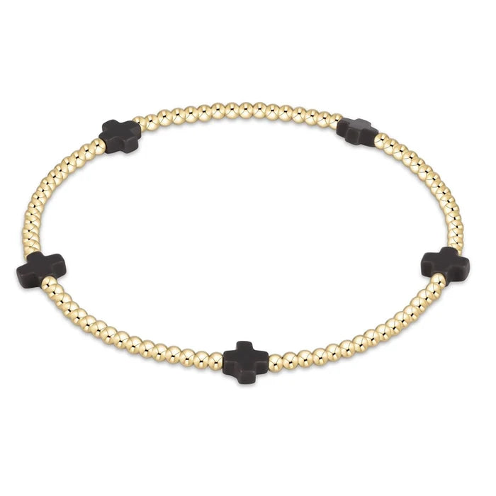 enewton design Signature Cross Pattern Bracelet with gold beads and charcoal cross accents on white background