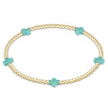 enewton design Signature Cross Pattern Bracelet with gold beads and mint cross accents on white background