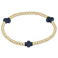 enewton design Signature Cross Pattern Bracelet with gold beads and navy cross accents on white background
