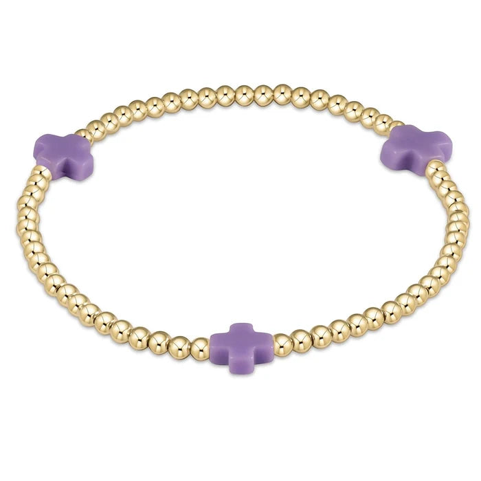 enewton design Signature Cross Pattern Bracelet with gold beads and purple cross accents on white background