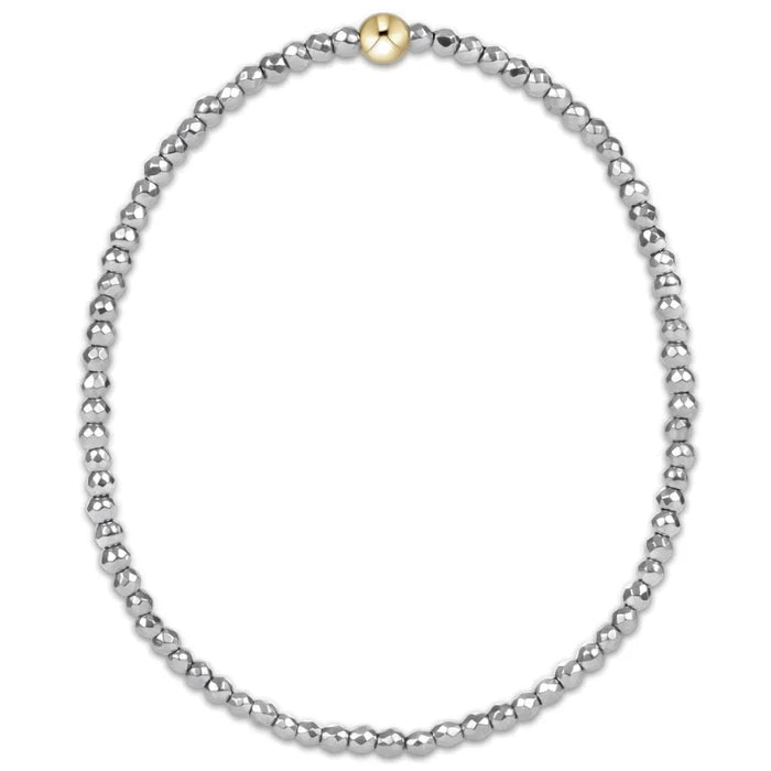 enewton design silver faceted hematite bead bracelet with single gold accent bead.
