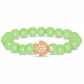 Fahlo Sage Glow Bracelet with glow-in-the-dark sage beads, engraved turtle charm, interactive real sea turtle tracking, and wildlife conservation support.