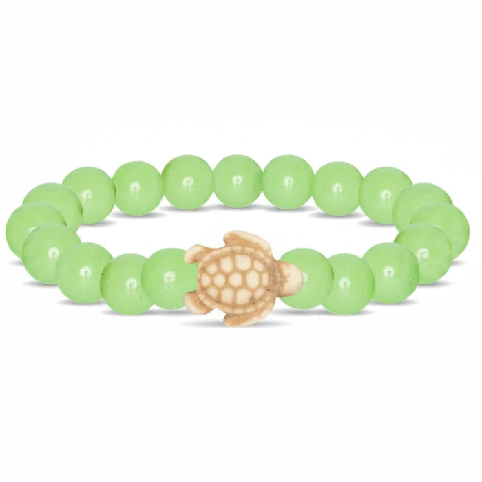 Fahlo Sage Glow Bracelet with glow-in-the-dark sage beads, engraved turtle charm, interactive real sea turtle tracking, and wildlife conservation support.