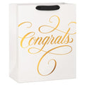 Large cream gift bag with gold calligraphy “Congrats”