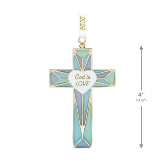 Decorative cross pendant with 'God is Love' message on a white background