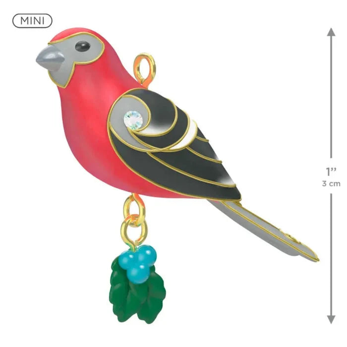 Colorful bird-shaped ornament with a size indicator on a white background