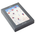 Hallmark greeting card packaging with skiing design on a white background