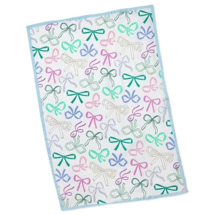 Blanket with colorful bow pattern on a white background