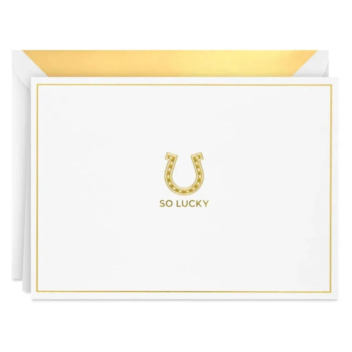 White card with gold border and horseshoe symbol, featuring 'So Lucky' text.