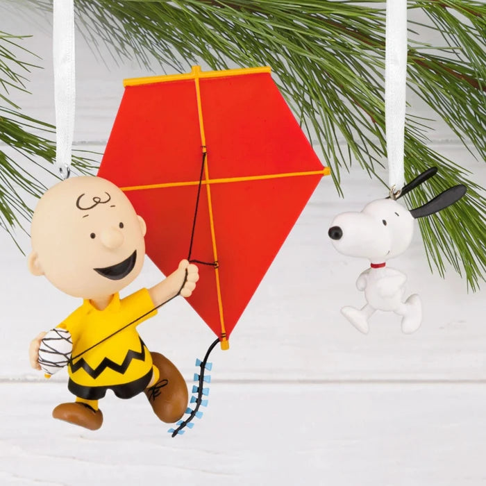 Peanuts® Charlie Brown and Snoopy Hallmark Ornaments Set of 2 featuring classic Peanuts characters in festive holiday designs for Christmas tree decorating and collectible holiday displays.