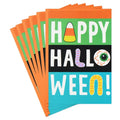 Stack of Halloween-themed greeting cards with colorful design and text.