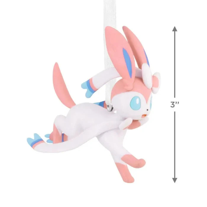 Hallmark Pokemon Sylveon Christmas ornament with measurements on a white background