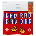 Pair of 'RAD DAD' socks with flames on a red background, displayed with Hallmark packaging.