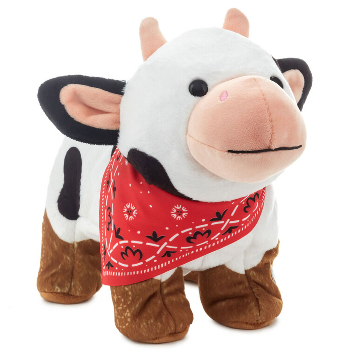 Plush cow with handkerchief around the neck