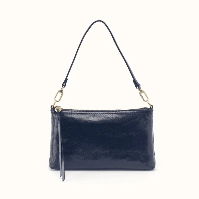 This HOBO Darcy Small Crossbody - Ink Navy blends effortless style with everyday functionality in a compact silhouette.