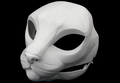 Photo showing a white, plastic 3D printed house cat fursuit head base complete with metal hardware at a 3/4 angle against a black background.