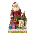 This Jim Shore 2026 Dated Santa Figurine features Jim Shore’s signature folk-art style, with intricate patterns, cheerful colors, and handcrafted details that create a warm and festive look.