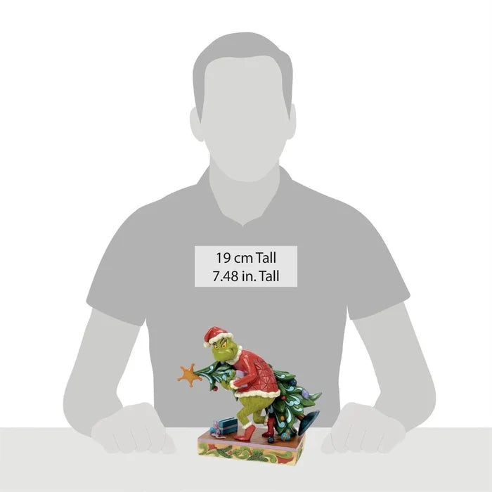 Grinch figurine with a Christmas tree, size indicated on a gray silhouette, white background