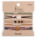Medium butterfly hair tie bracelet with a natural-inspired design and elegant earthy tones.