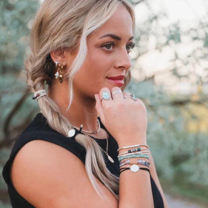 Medium butterfly hair tie bracelet with a natural-inspired design and elegant earthy tones.