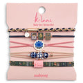 Medium Mahjong-themed hair tie bracelets in pink, green, and blue with lotus flower and Mahjong tile accents.