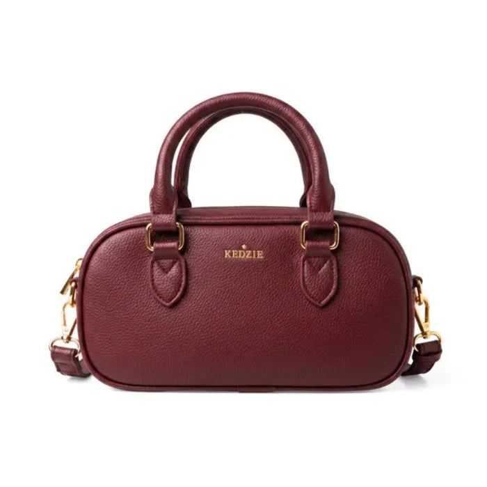 DM Merchandising Kedzie Gia Crossbody Bag with stylish compact design for everyday use