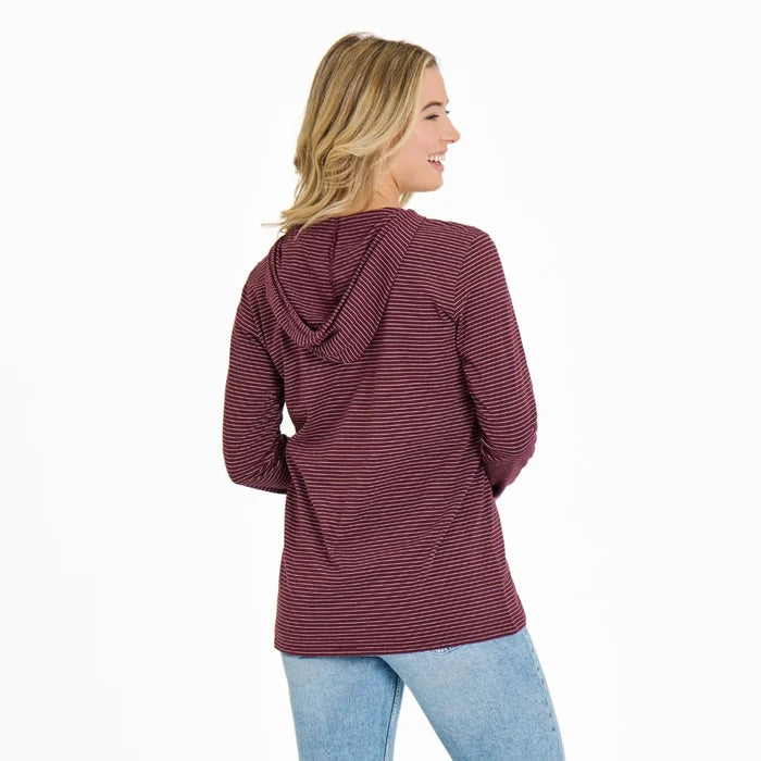 Woman wearing a burgundy striped hoodie on a white background