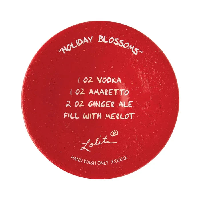 This Lolita Holiday Blossoms Wine Glass adds a cheerful seasonal touch to your table, while the classic wine glass shape makes it perfect for serving your favorite drinks.