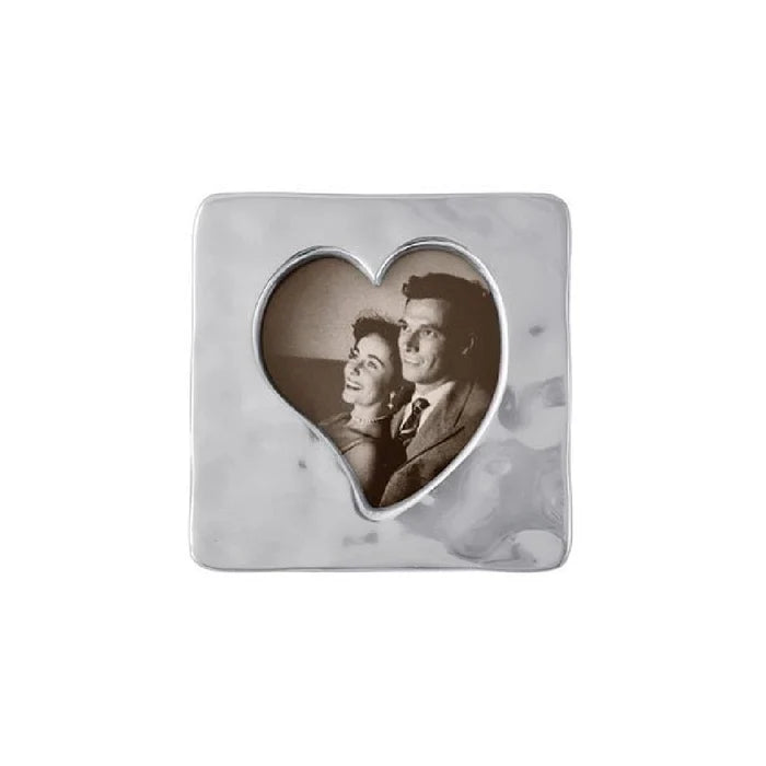 A decorative photo frame featuring a heart shape design, ideal for displaying cherished memories.