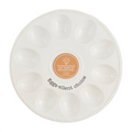 White ceramic Mud Pie Deviled Egg Tray labeled “Eggs-cellent choice.”
