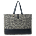 This Myra Carmela Weekender Bag brings together vintage Western charm and practical travel style