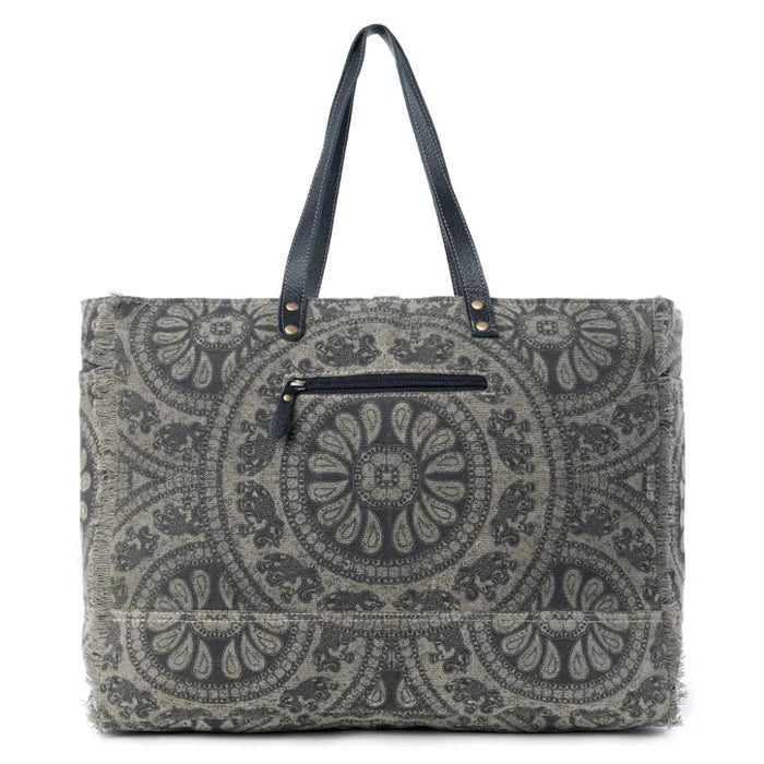 This Myra Carmela Weekender Bag brings together vintage Western charm and practical travel style