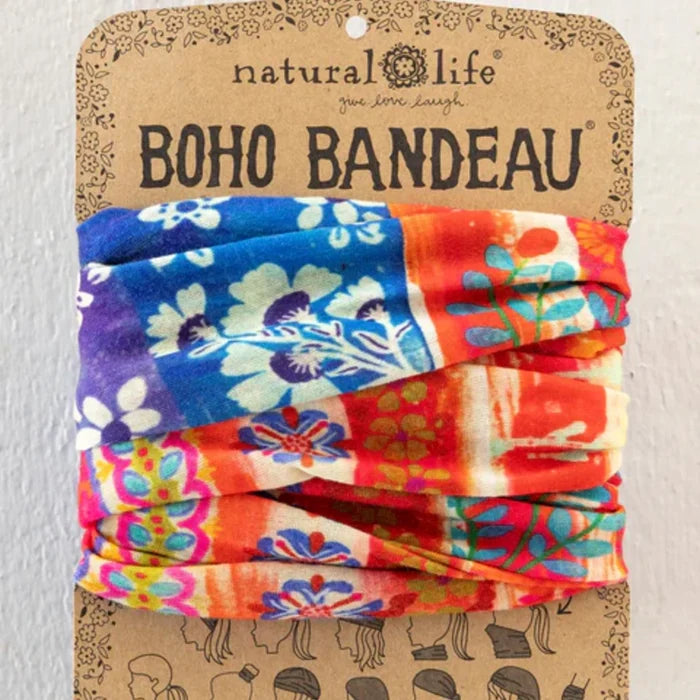 The boho bandeau features a lively, colorful fabric with an eclectic mix of patterns and shades.