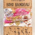 A boho-style bandana featuring a natural life design with earthy colors and intricate patterns.